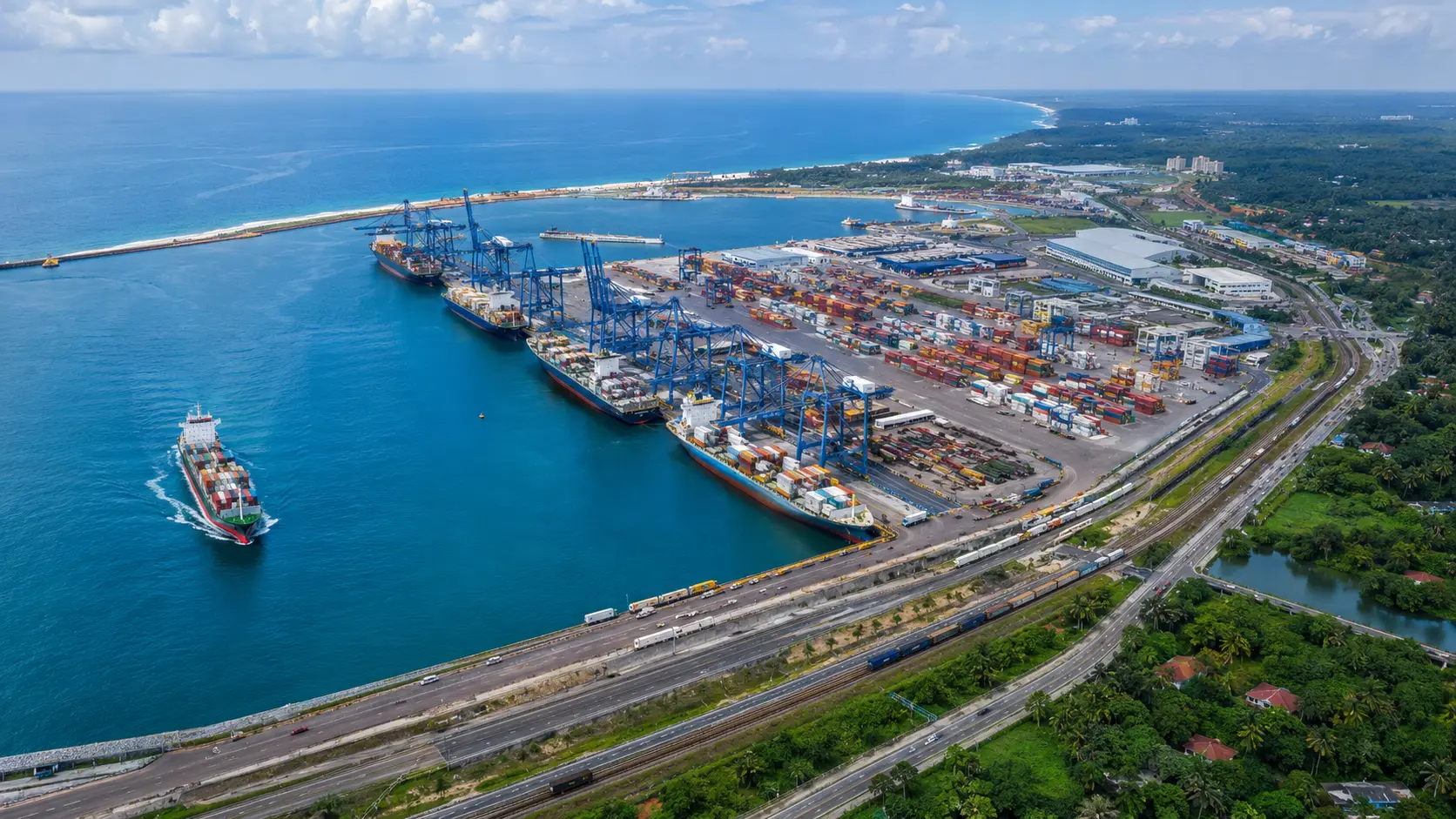 Illustrative aerial vision of a busy deep-water container port with multiple ships, cranes and logistics connections